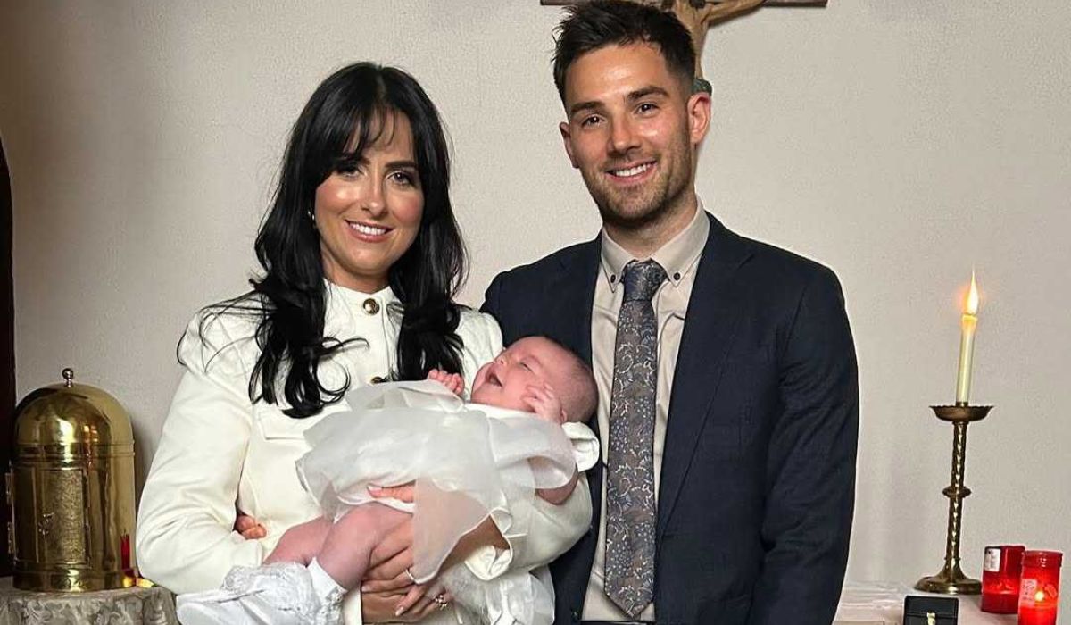 Lisa McHugh and family at daughter's christening