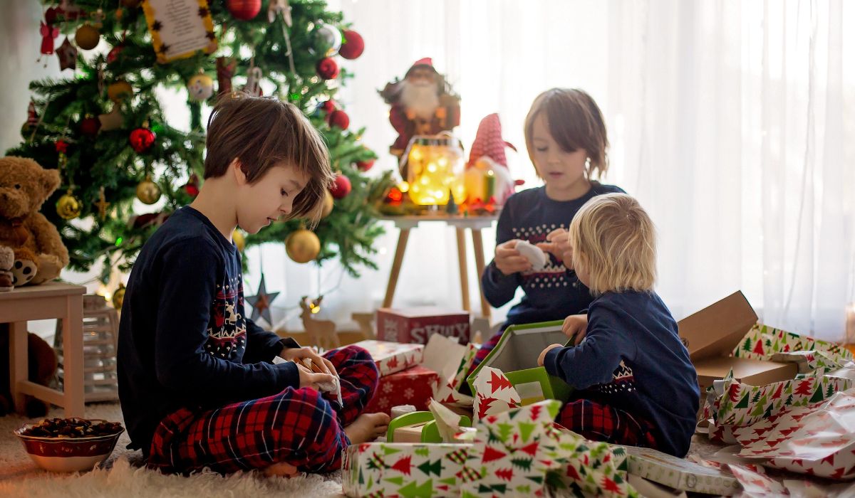 Kids opening toys on Christmas Day