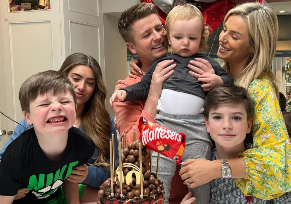 Pippa O Connor with her husband Brian holding up son Billy on his second birthday.