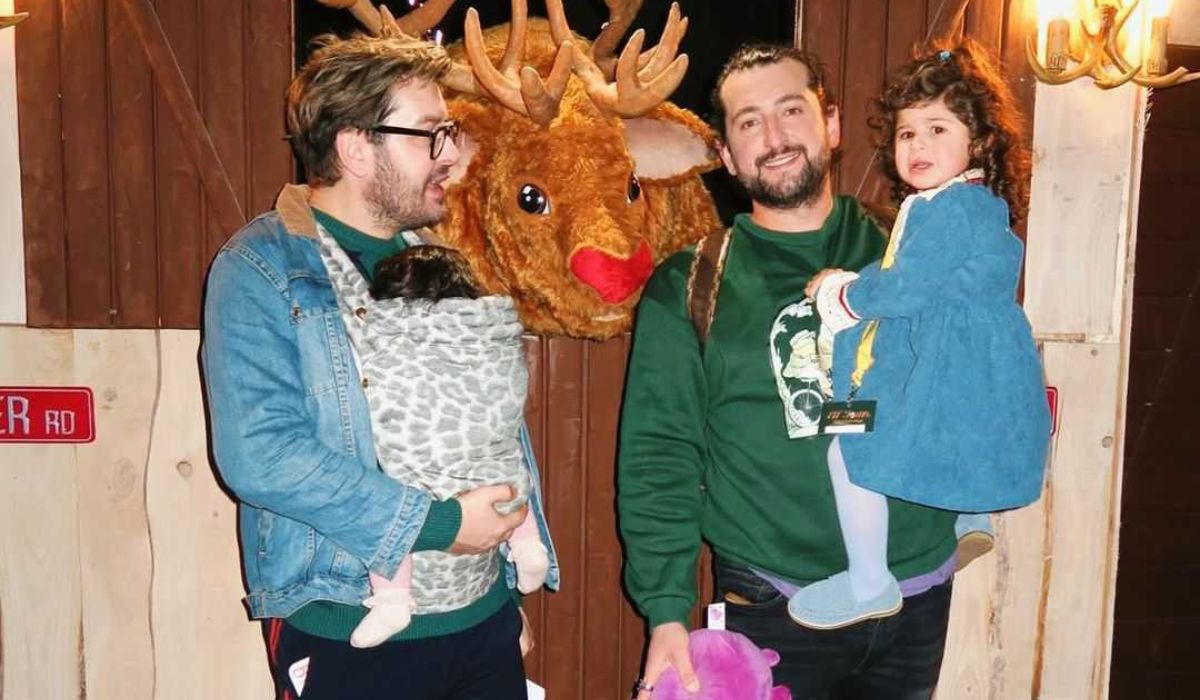 Brian Dowling and Arthur Gourounlian take their daughters to see Santa