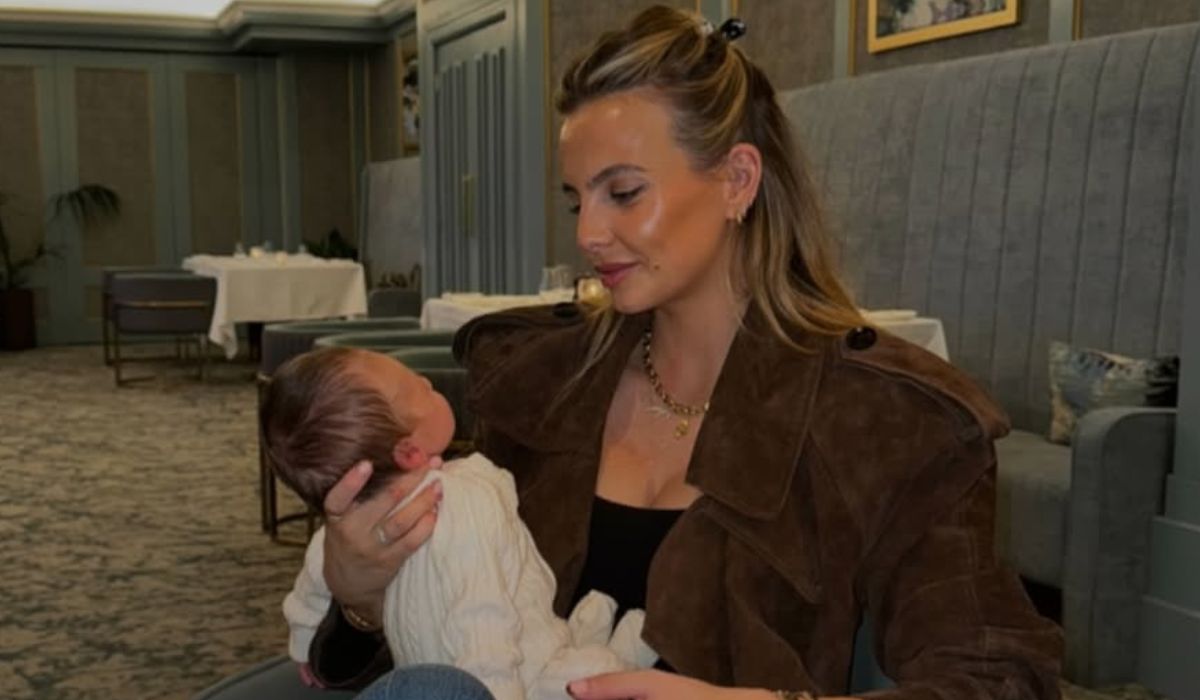 Joanna Cooper looking at her baby boy