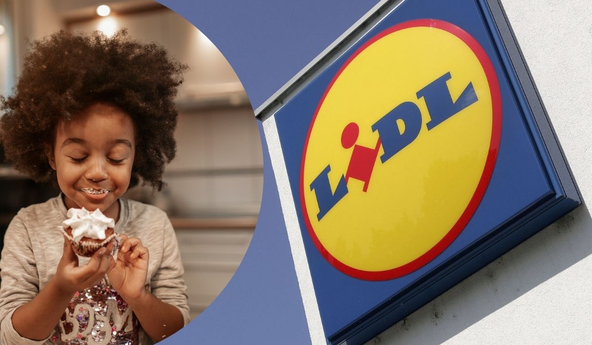 Little girl eating a cupcake beside the Lidl sign