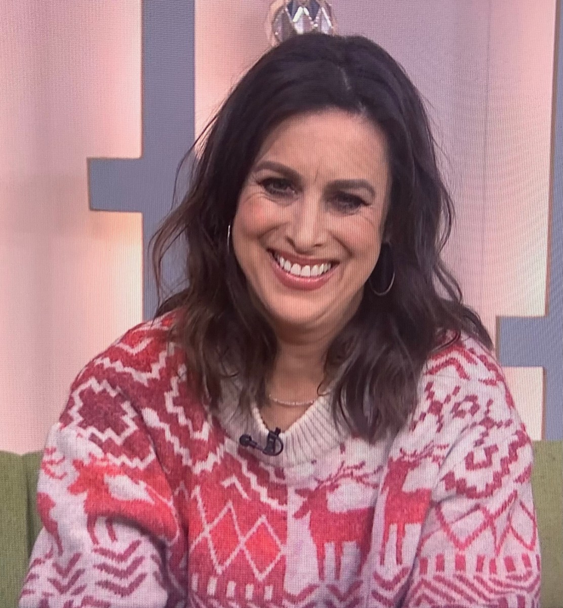 Lucy Kennedy wearing a Christmas jumper on The Six O'Clock Show