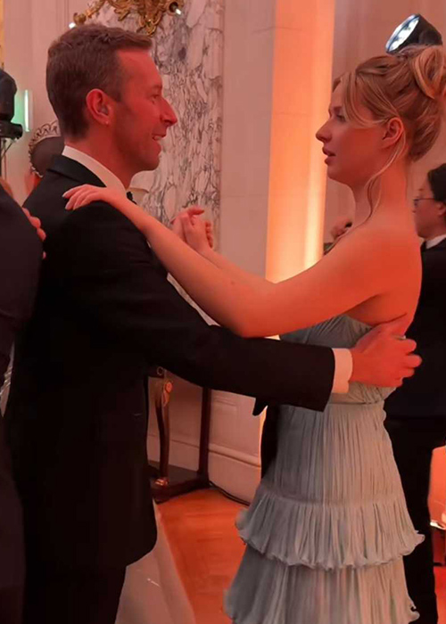 Chris Martin dancing with his daughter Apple at the ball. Pic: TikTok