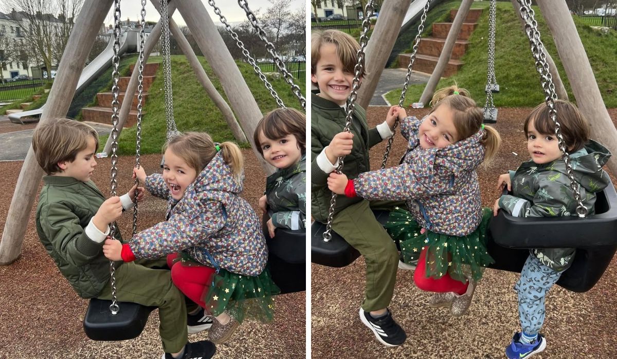 Theodore, Gigi and Otto Matthews on the swings in a playground in Howth