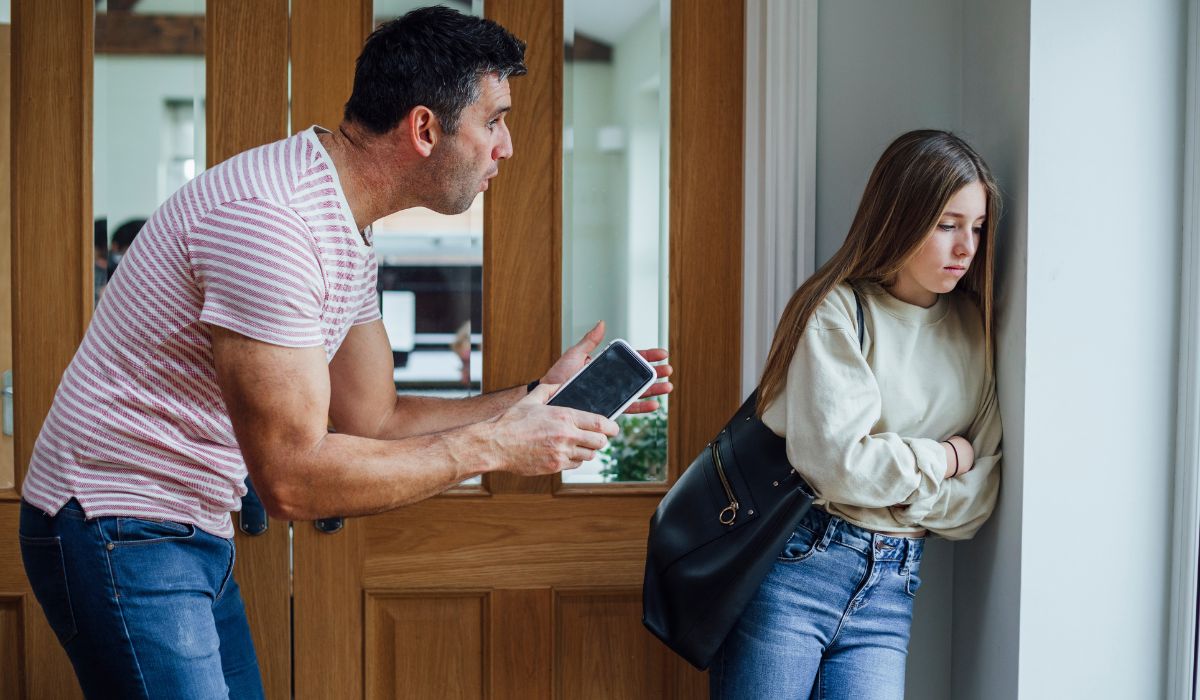 Dad scolding daughter