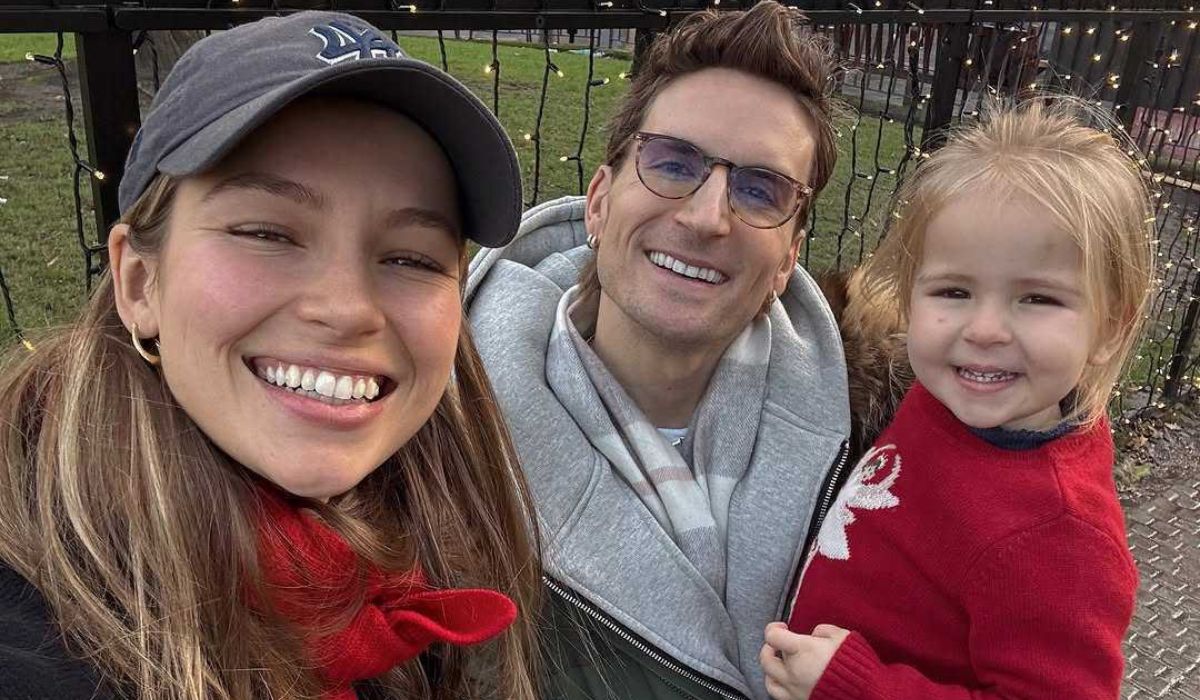 Emma Louise Connolly with her husband and daughter