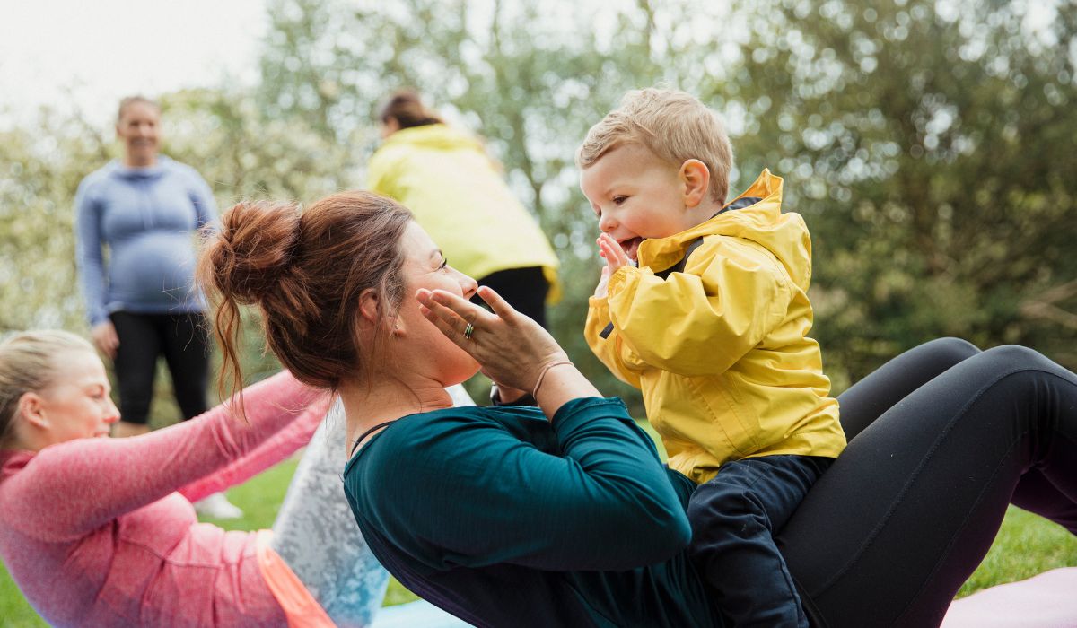 Mum doing yoga with her toddler