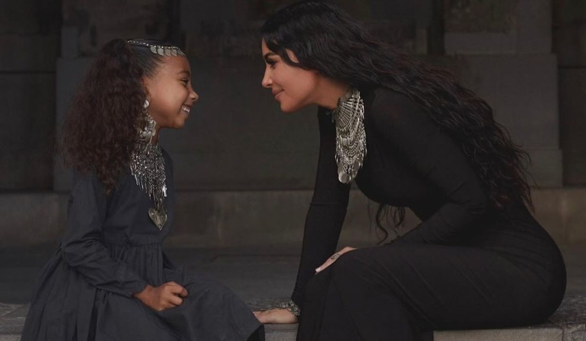 Kim Kardashian and daughter North West dressed in black dresses and jewellery