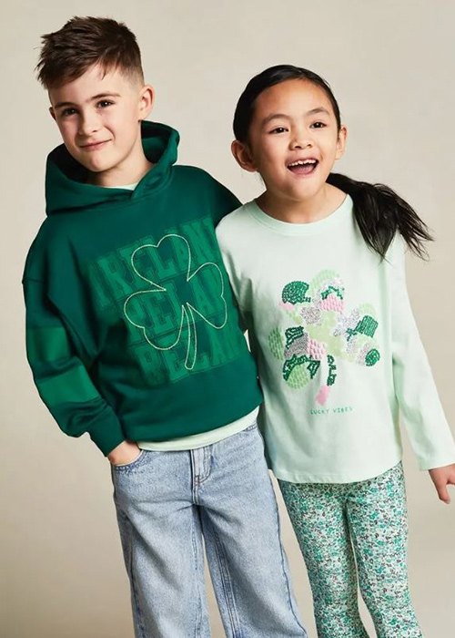 St. Patrick's Day Varsity Hoodie (€10) and Sequin Long Sleeve Top (€9). Pic: Dunnes Stores