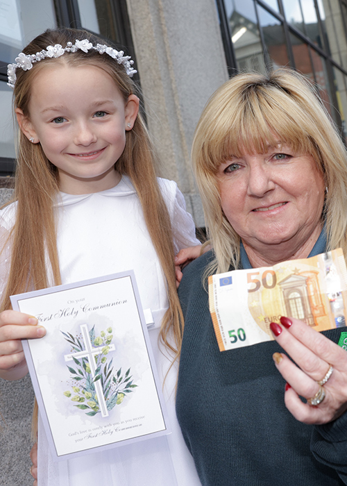 An Post postal operative and grandmother of thirteen Michelle Lumsden with Georgia (9) ahead of her Communion Day. Pic: An Post
