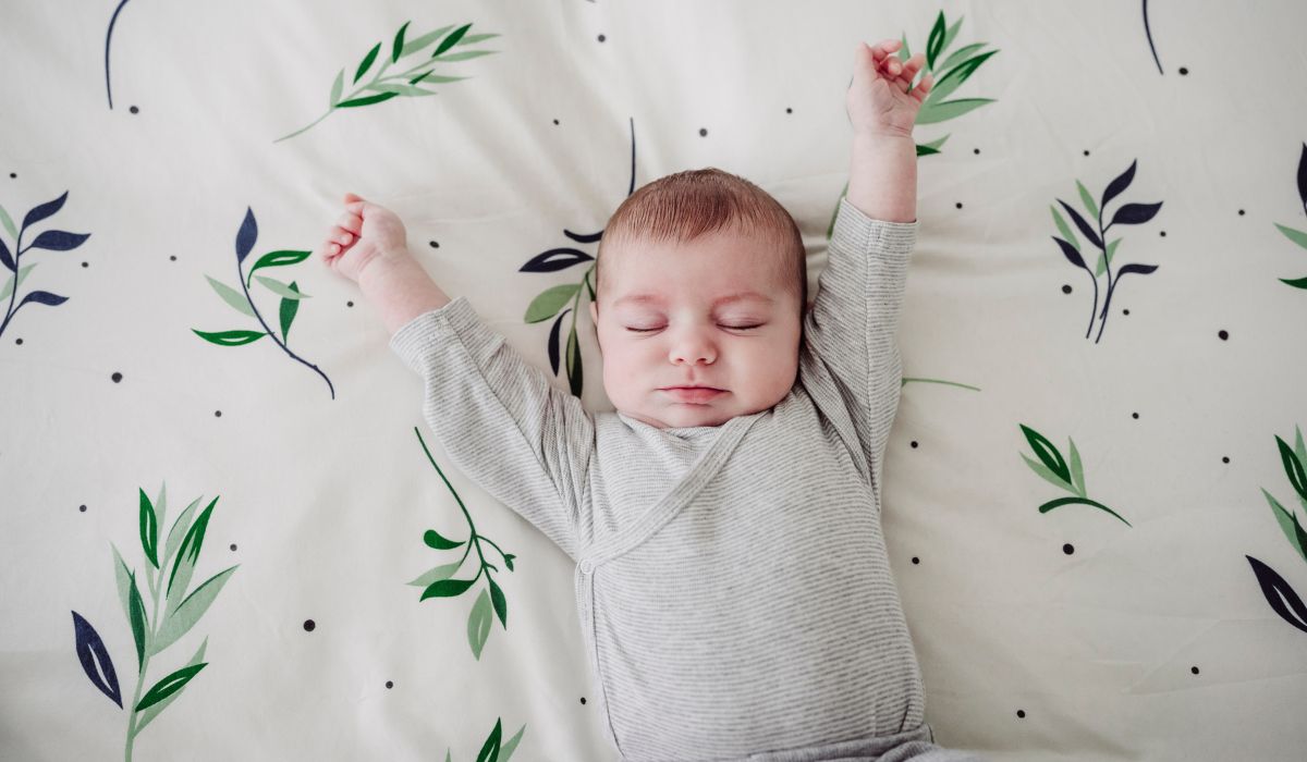 Baby sleeping in bed