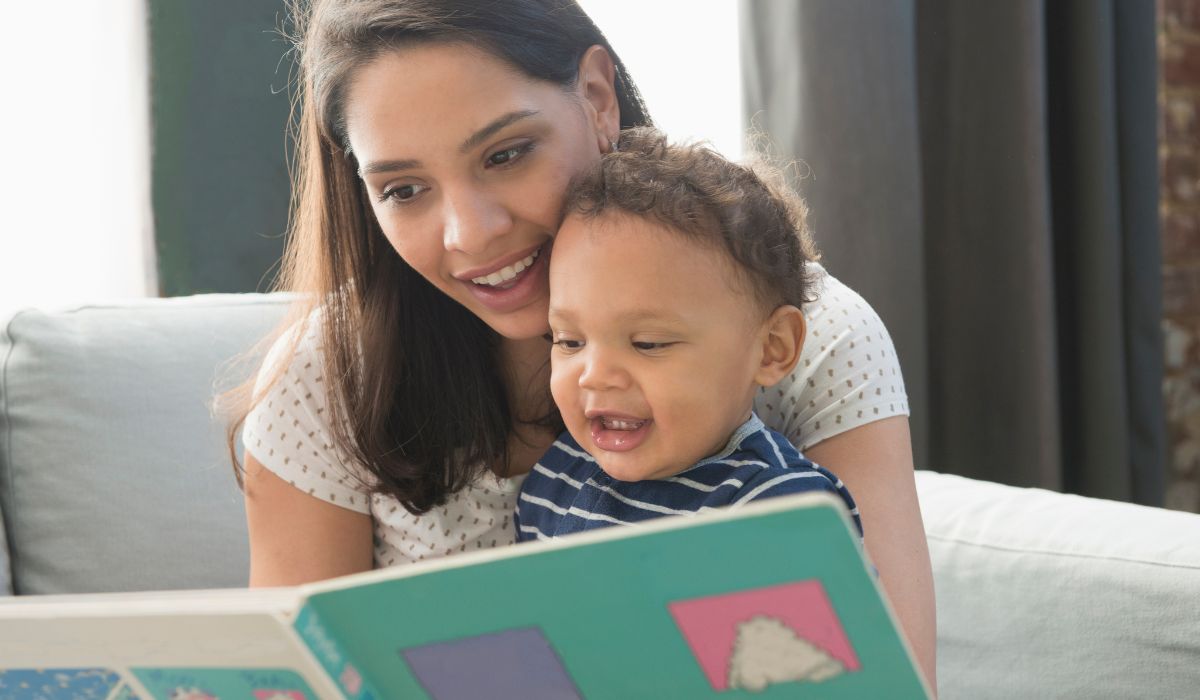Mother reading to baby