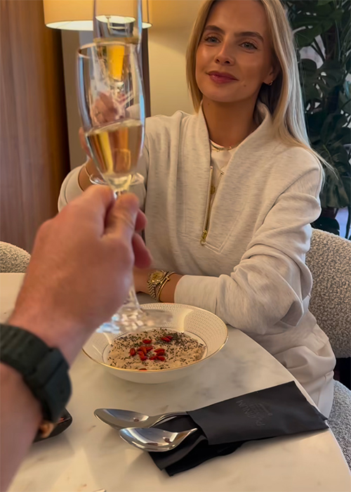 Joanna Cooper toasting her husband in Dublin Airport. Pic: Conor Murray /Instagram