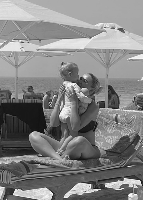 Molly-Mae with Bambi by the pool. Pic: Molly-Mae/Instagram