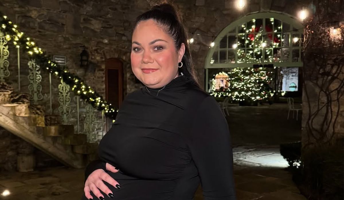 Grace Mongey in a black dress