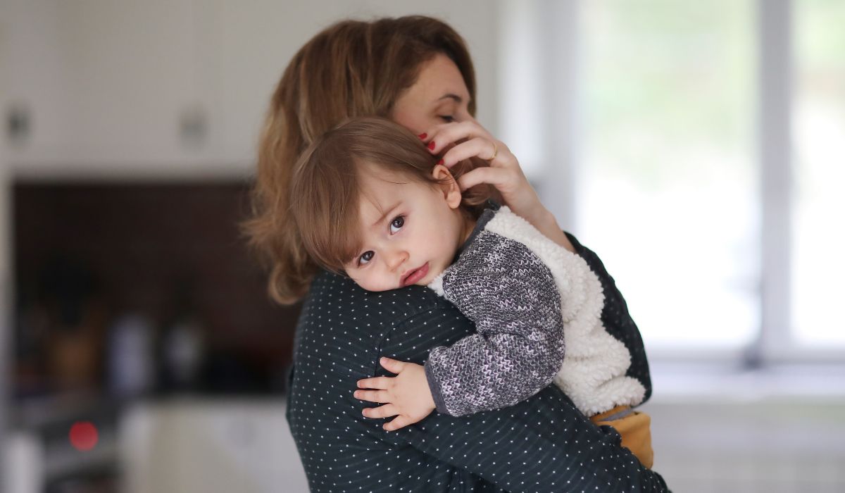 Baby resting on mum's shoulder