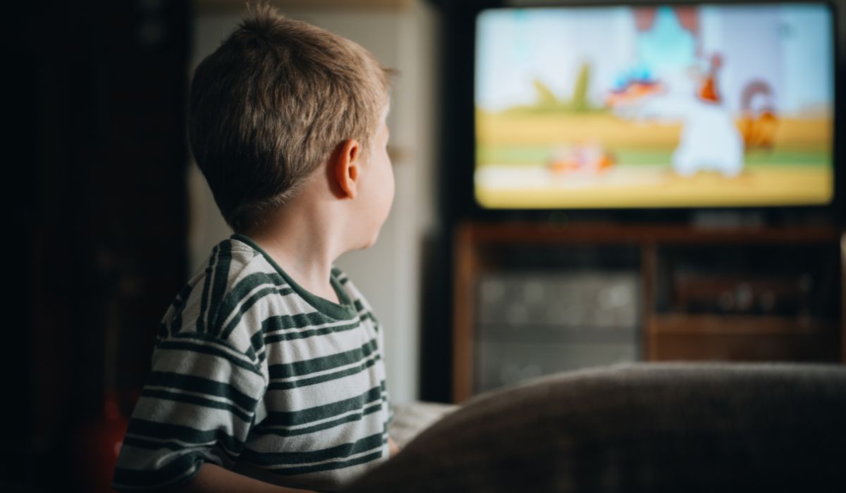 Little boy watching cartoons
