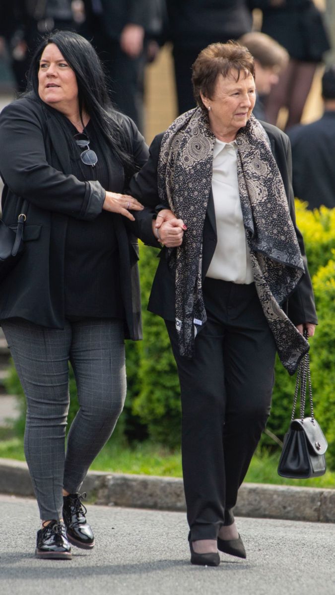 Eamon Farrell’s wife, Eileen (r) at her husband’s funeral. PIC