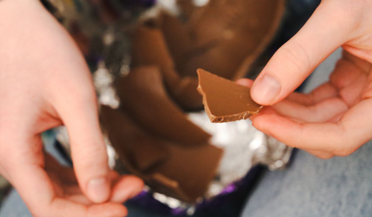 Person opening Easter egg