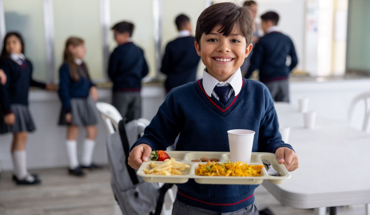 Boy eating at school