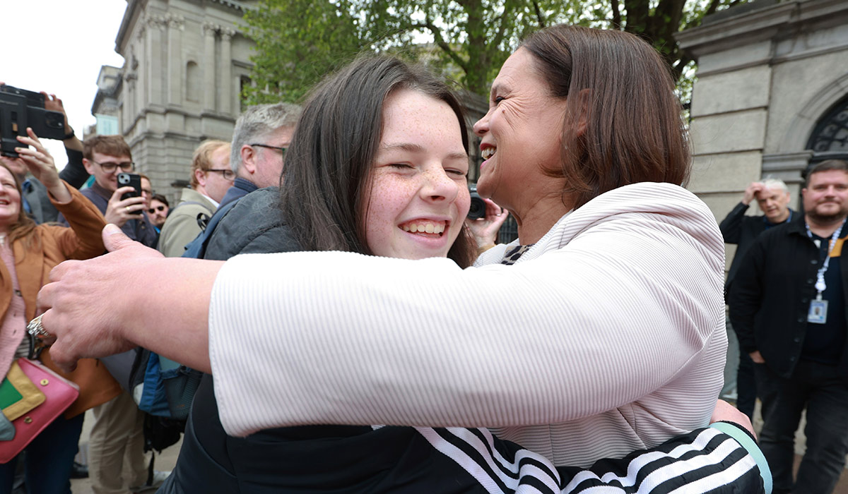 Campaigner Cara Darmody, 14, meets Sinn Féin leader Mary Lou McDonald outside Leinster House. Pic: Leah Farrell/RollingNews.ie