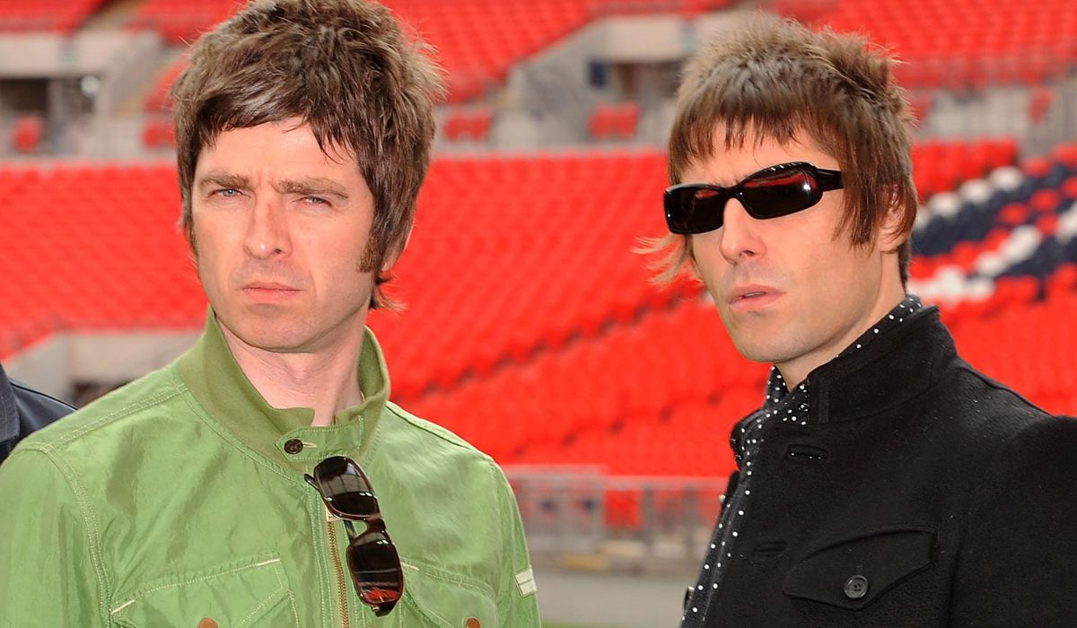 Noel Gallagher (left) and Liam Gallagher of Oasis pose at Wembley Stadium on October 16, 2008 in London, England