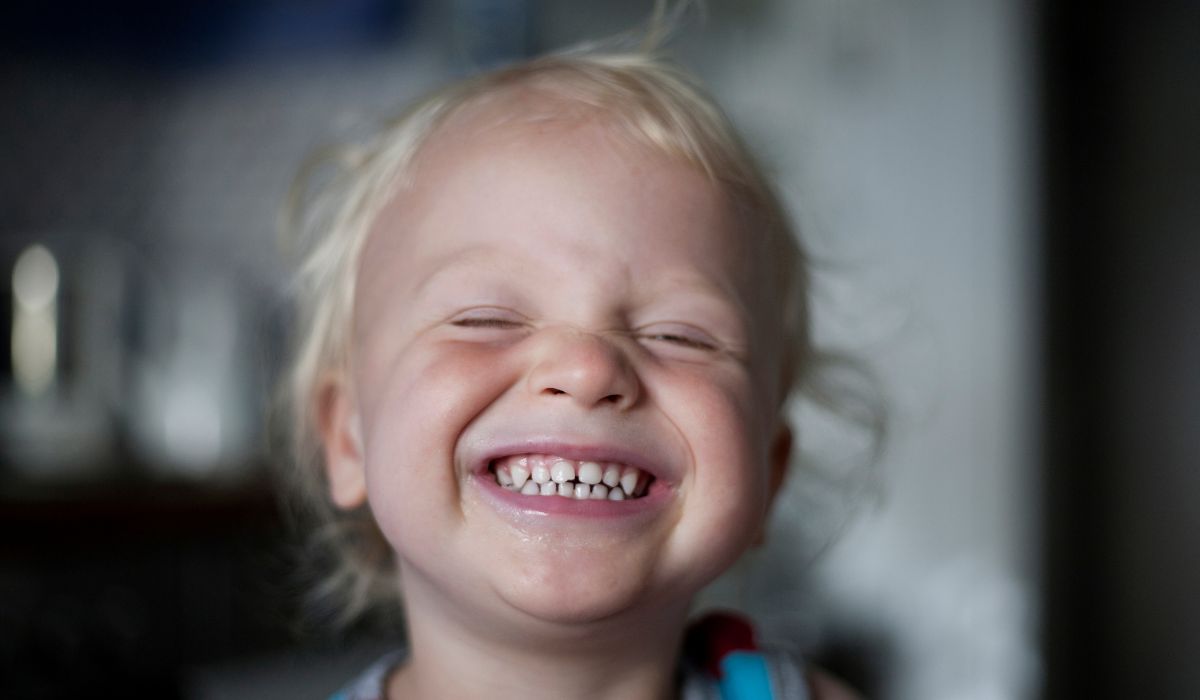 Little toddler boy smiling