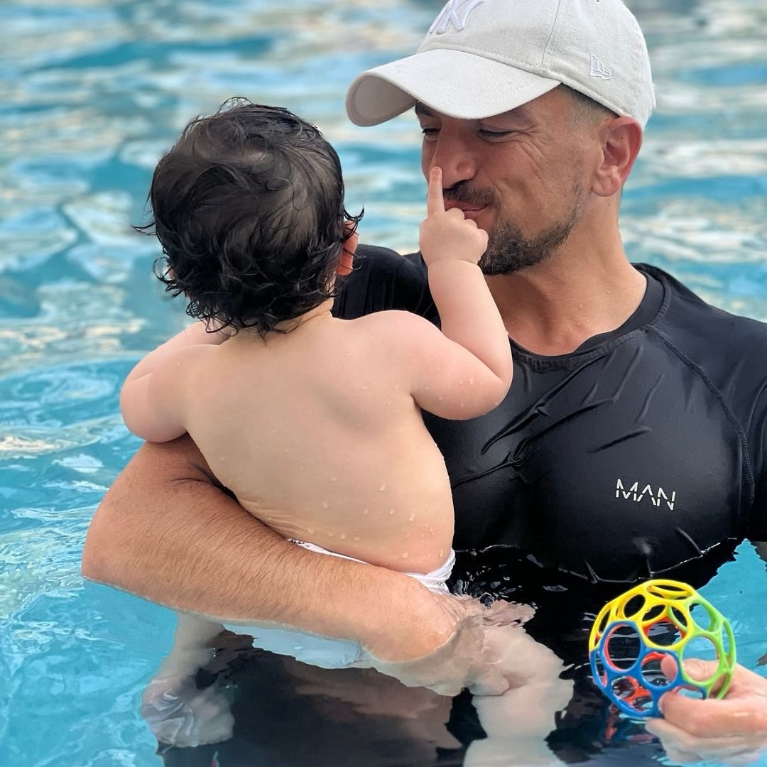 Peter Andre with his daughter Arabella in a swimming pool