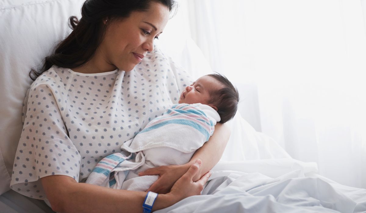 mum in bed with her baby