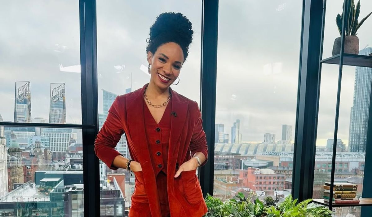 Michelle Ackerley in a red suit