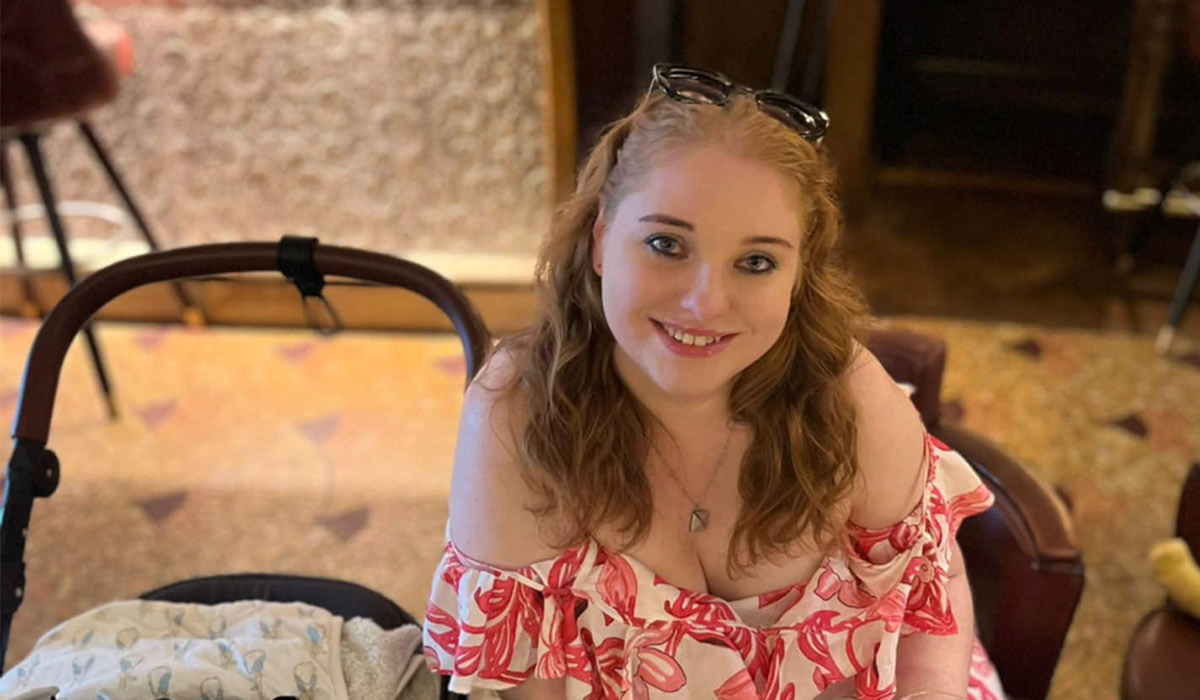 Woman smiling at a Dublin restaurant