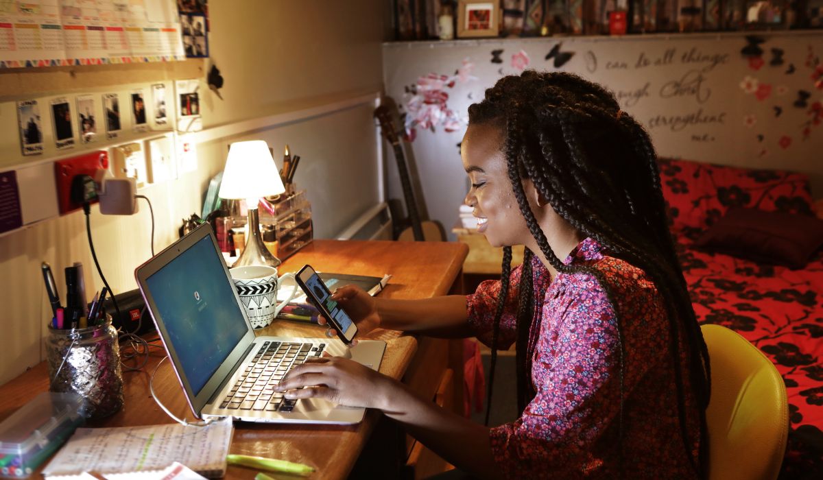 College student studying at home