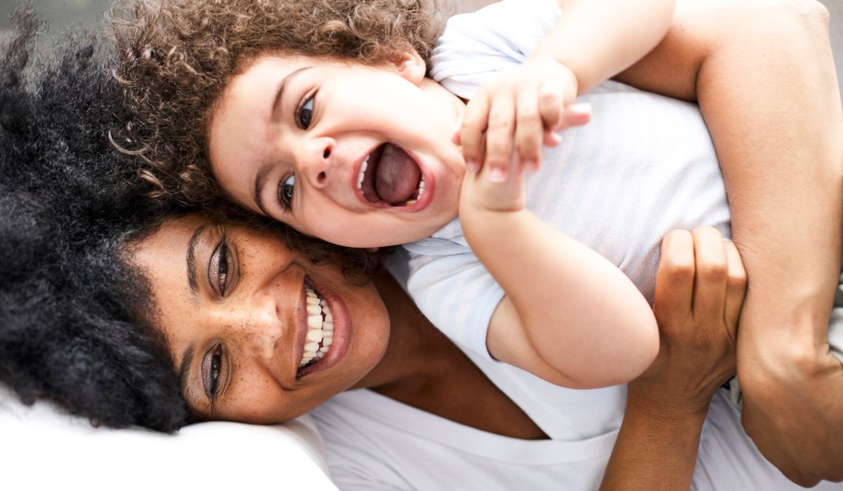 Mother and toddler cuddling