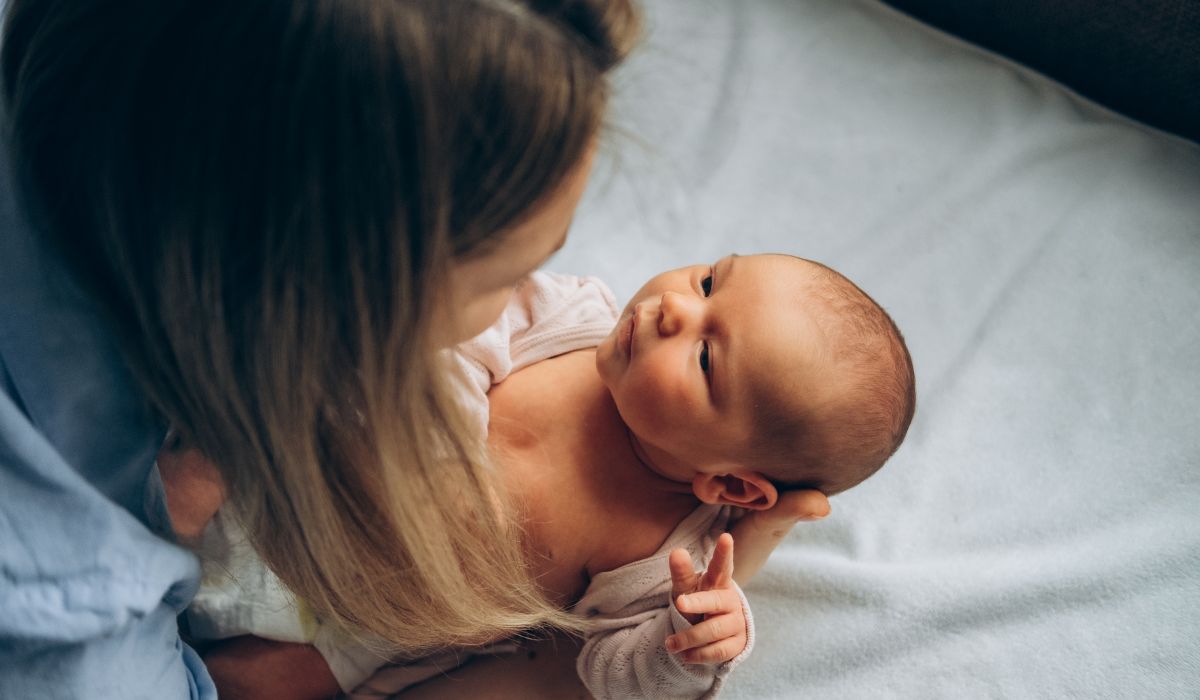 Mother holding newborn