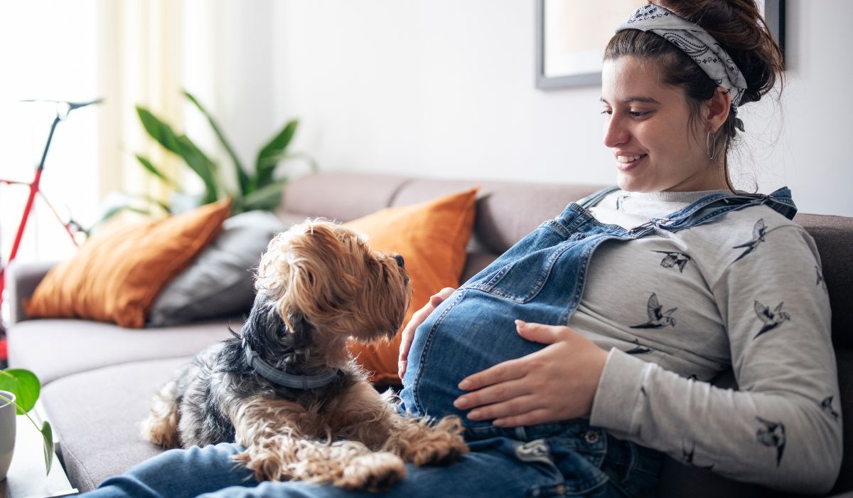 Pregnant woman and her dog