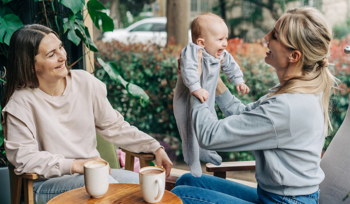 Mum in coffee shop with her baby