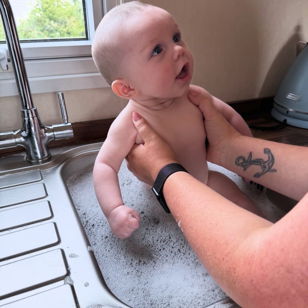 Grace Mongey's son Kasen the kitchen sink