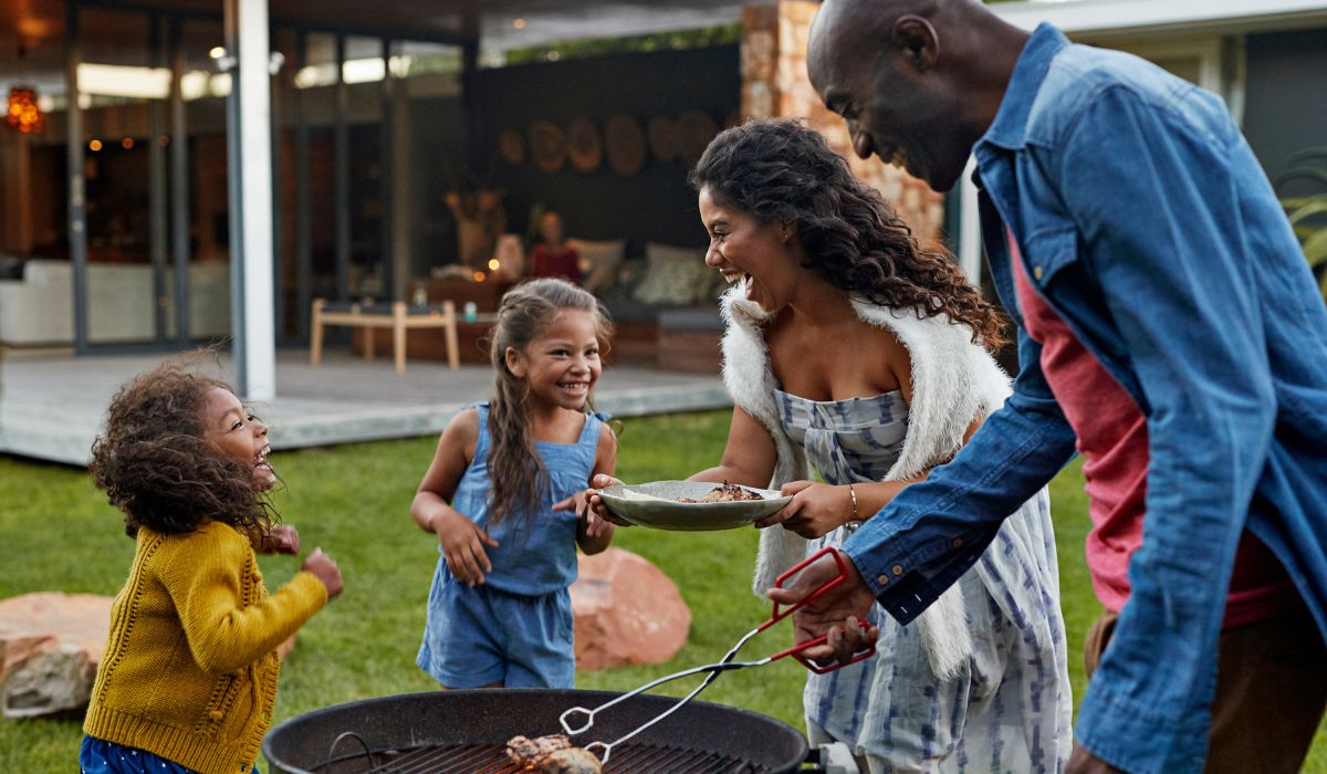 Family having BBQ