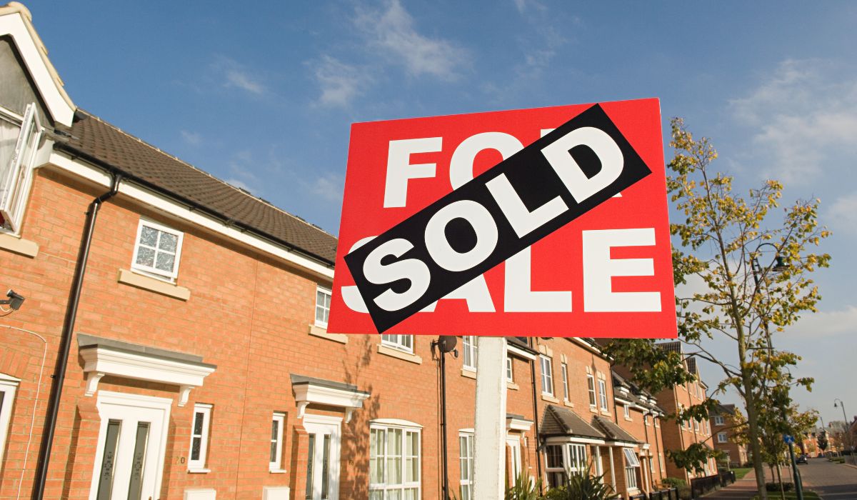House with a sold sign out the front