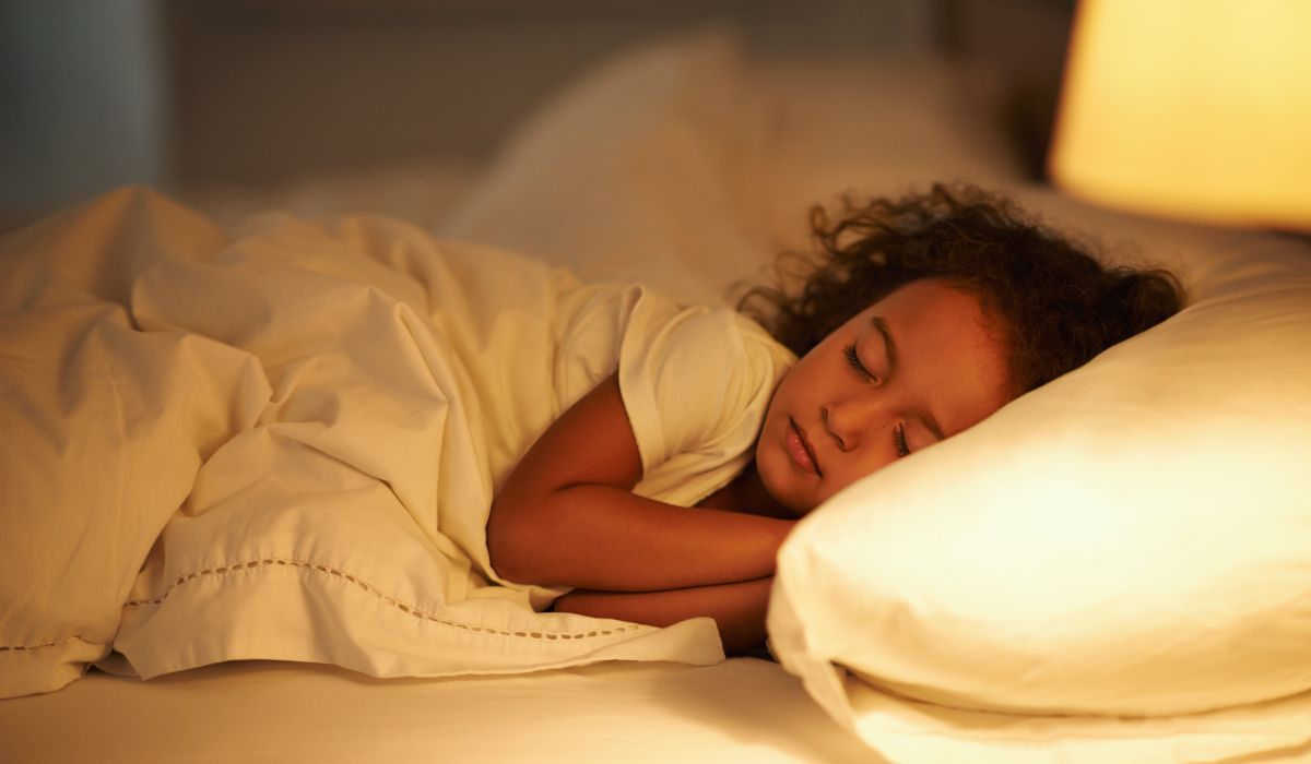 Girl asleep in bed