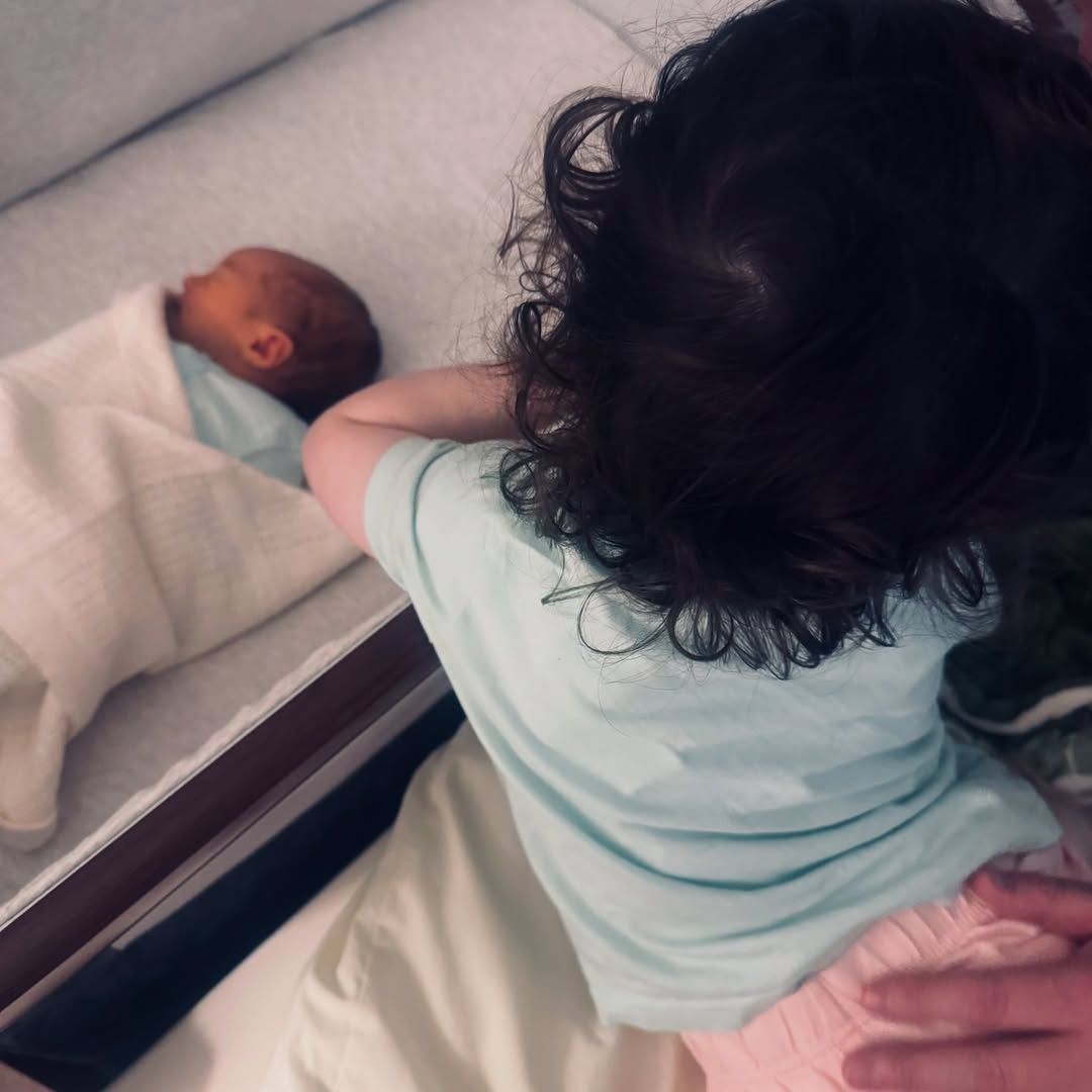 Sinéad de Butléir's daughter Mallaidh and her newborn son