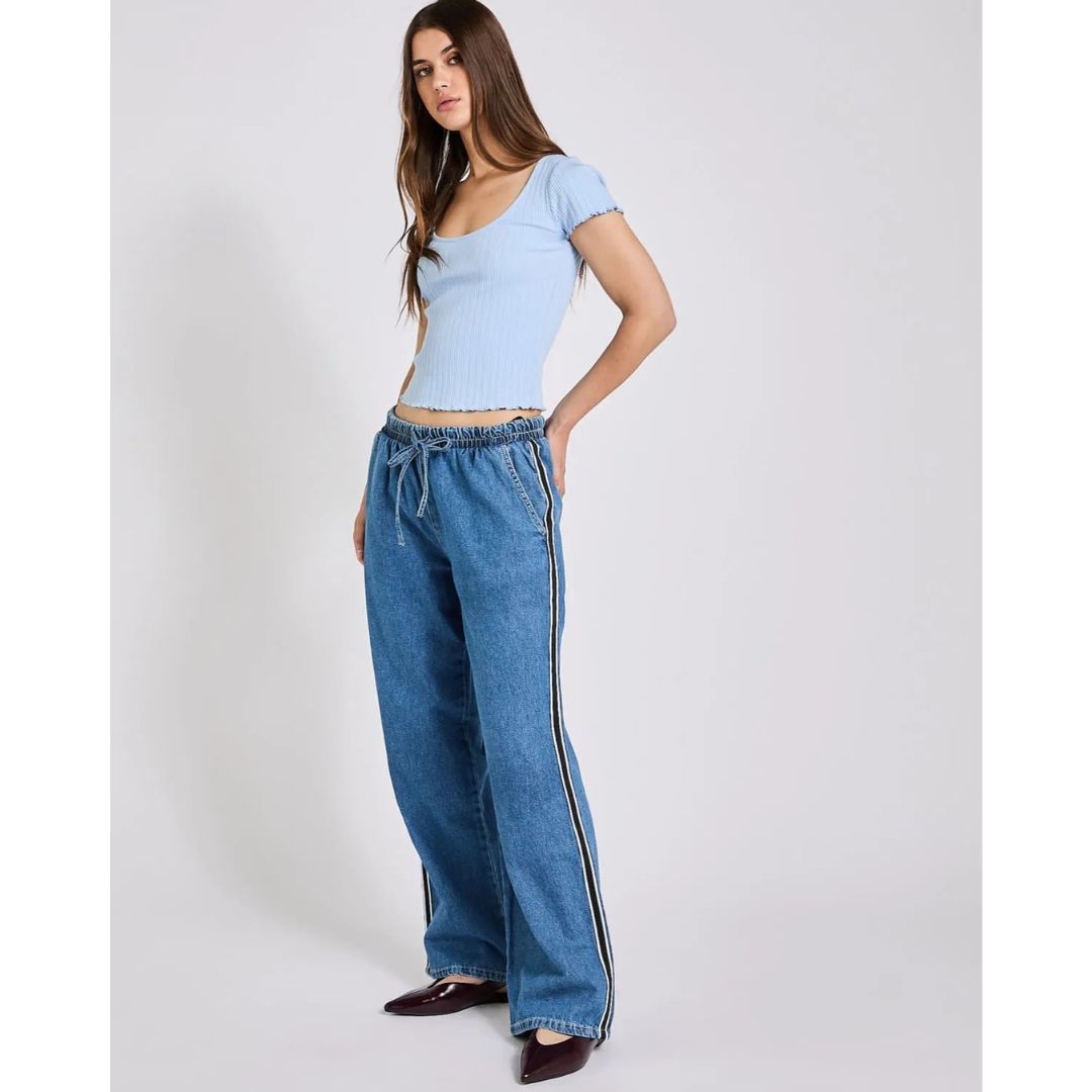Dunnes Stores model wearing denim joggers