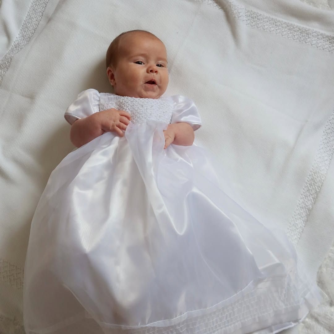 Renn McCurry on her christening day