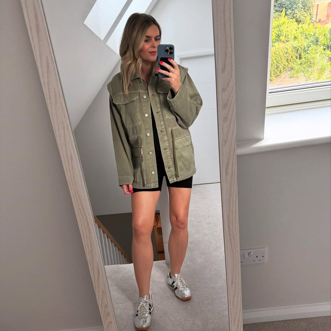 Ailbhe Garrihy taking a selfie in a Penneys jacket before the Oasis concert