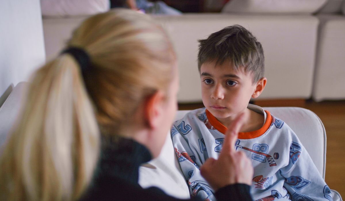 Mother scolding son