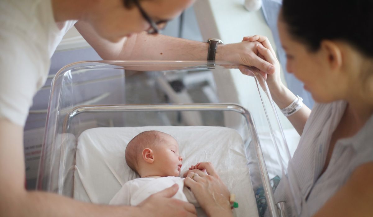 Parents and newborn baby