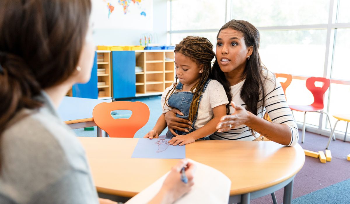 Teacher talking to parent