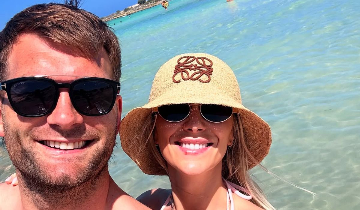 Aidan O’Shea and his wife Kristin McKenzie Vass taking a selfie in front of blue seas
