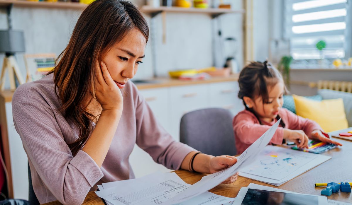 Stressed mother budgeting